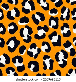 Animal skin print. Leopard seamless pattern. Natural wildlife camouflage texture. Repeating spots motif. Hand drawn background. Vector abstract wallpaper