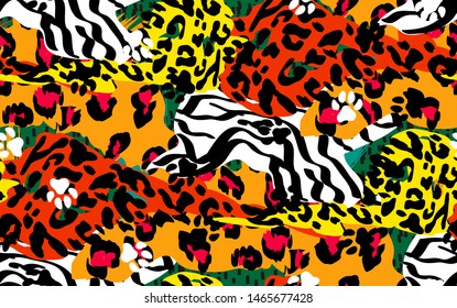 Animal skin print leopard, tiger, zebra vector seamless pattern on green background. Yellow, rad, orange, black animal texture. The skin of wild tropical beasts in the african style.