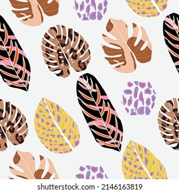 Animal skin print on tropical leaves trendy seamless pattern. Exotic foliage background with grunge skin texture for textile, fabric and print design.