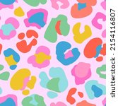 Animal skin print in rainbow colors, 90s style. Colorful leopard spot seamless pattern design. Abstract blob, rosettes texture. Bold summer vector illustration for surface wrapping, fun fabric design