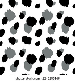 Animal skin seamless pattern. Animals trendy background with black and grey spots. Modern design for print, card, postcard, fabric, textile. Vector illustration.