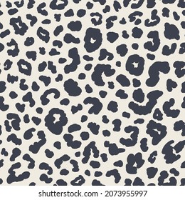 Animal skin seamless repeat pattern. Random placed, vector spot leopard print all over surface print on beige white background.