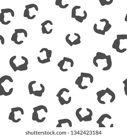 Animal texture. Animal skin. Seamless pattern of stains. Scattered uneven shapes. Vector graphics