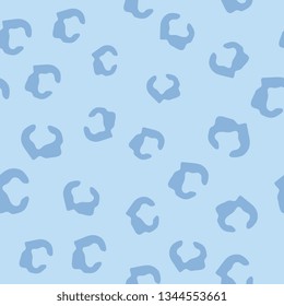 Animal texture. Animal skin. Seamless pattern of stains. Scattered uneven shapes. Vector graphics