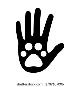 Animal trace on a human hand icon vector illustration isolated on white background. Help and save concept.  Footprint symbol.