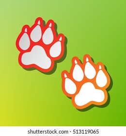 Animal Tracks sign. Contrast icon with reddish stroke on green backgound.