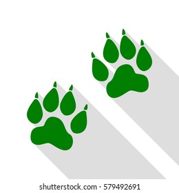 Animal Tracks sign. Green icon with flat style shadow path.