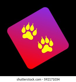 Animal Tracks sign. Vector. Yellow icon at violet-red gradient square with rounded corners rotated for dynamics on black background.