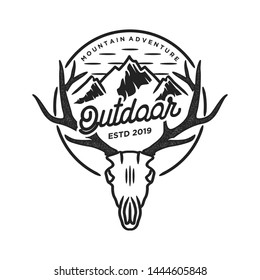 Animal wildlife deer hunting with mountain head deer vintage logo.