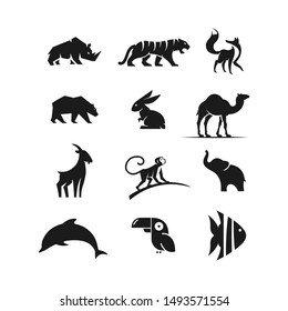 animals rhino, tiger, fox, bear, rabbit, camel, goat, monkey, elephant, dolphin, bird, fish set logo vector silhouette