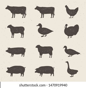 Animals silhouettes icons set. Cow, Pig, Sheep, Lamb, Hen, Duck, Turkey, Bull. Vintage farm animals silhouettes with stamp effect. Vector illustration