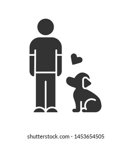 Animals welfare and help glyph icon. Pup and master. Pet adoption from shelter. Volunteer activity. Man with faithful dog. Silhouette symbol. Negative space. Vector isolated illustration