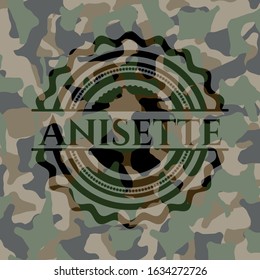 Anisette written on a camo texture. Vector Illustration. Detailed.