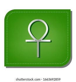 Ankh symbol, egyptian word for life, symbol of immortality. Silver gradient line icon with dark green shadow at ecological patched green leaf. Illustration.