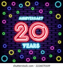 Anniversary 20 years Badge in neon style. Glowing with colorful neon light. Neon text. Modern trend design. Vector Illustration