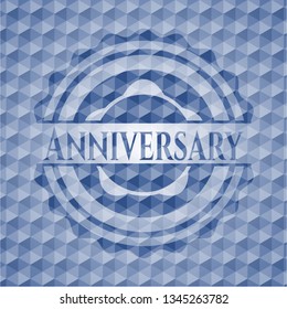 Anniversary blue emblem or badge with geometric pattern background.