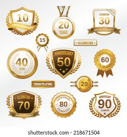 Anniversary celebration golden labels and badges set isolated vector illustration