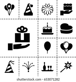 Anniversary icon. set of 13 filled anniversaryicons such as cake with one candle, heart cake, party hat, balloon, fireworks, wine bottle and glass, gift on hand, sparklers