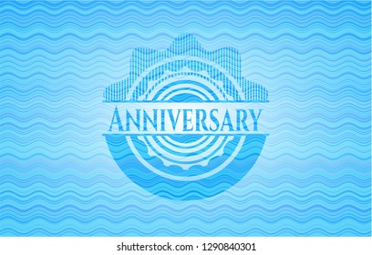 Anniversary light blue water badge.
