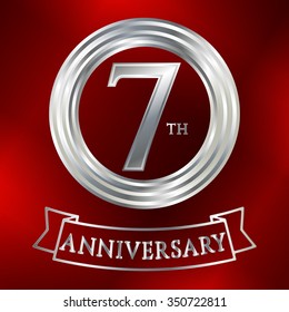 Anniversary silver ring logo number 7. Anniversary card. Red background. Vector illustration.