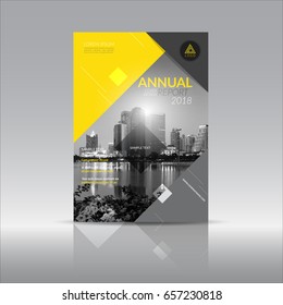 
Annual report cover, flyer, presentation, brochure. Front page with A4 mark and  bleed guide. Design layout template in A4 size . Building background with yellow grey color templates.