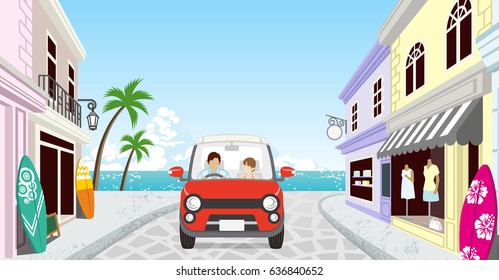 Anonymous Couple driving in the Seaside town