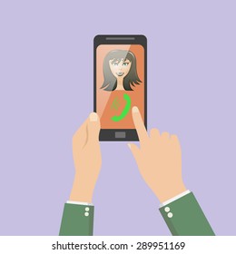 answer the phone rings. video call. face of the girl on the phon