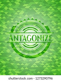 Antagonize green emblem with triangle mosaic background