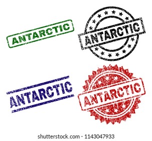 ANTARCTIC seal prints with distress style. Black, green,red,blue vector rubber prints of ANTARCTIC caption with dust style. Rubber seals with round, rectangle, medal shapes.