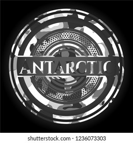 Antarctic written on a grey camouflage texture