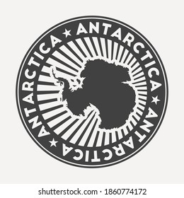 Antarctica round logo. Vintage travel badge with the circular name and map of the country, vector illustration. Can be used as insignia, logotype, label, sticker or badge of Antarctica.