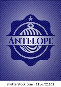 Antelope badge with denim background