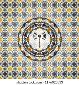 antenna signal icon inside arabesque style badge. arabic decoration.