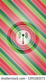 antenna signal icon inside christmas colors emblem.