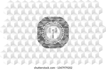 antenna signal icon inside grey badge with geometric cube white background