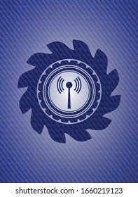 antenna signal icon inside jean or denim emblem or badge background