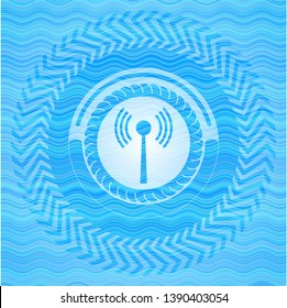 antenna signal icon inside light blue water emblem.