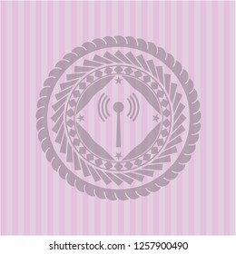 antenna signal icon inside pink emblem