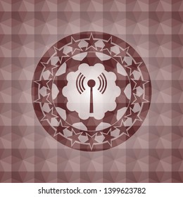 antenna signal icon inside red seamless emblem or badge with abstract geometric polygonal pattern background.