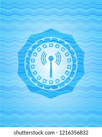 antenna signal icon inside sky blue water style badge.