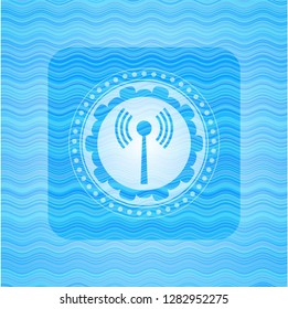 antenna signal icon inside water wave representation emblem.