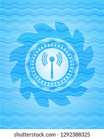 antenna signal icon inside water wave representation emblem.