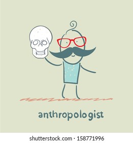 anthropologist holds skull