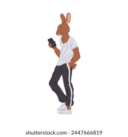 Anthropomorphic rabbit character, dressed in modern clothes, holding a mobile device. Vector illustration depicting a full-length clothed animal figure.