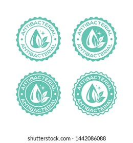 Antibacterial labels set. Vector badges with clean drop with fresh leaves and sparklers for package design.