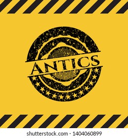 Antics grunge black emblem with yellow background, warning sign. Vector Illustration. Detailed.