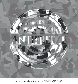 Antifreeze on grey camo texture
