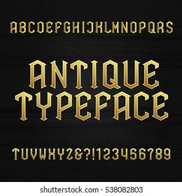 Antique alphabet vector font. Type letters symbols and numbers on a wooden background. Vintage vector alphabet for labels, headlines, posters etc.