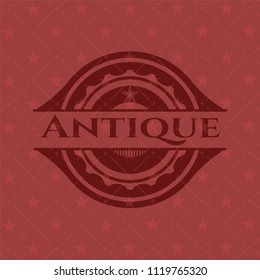 Antique badge with red background