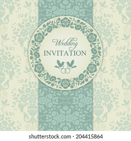 Antique baroque wedding invitation, ornate round wreath frame, couple of birds with ring, blue and beige
